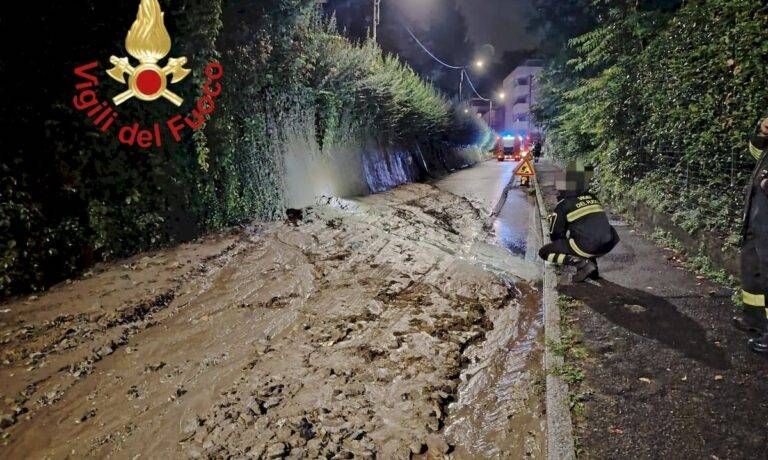 Como fango strada maltempo